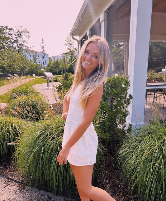 EYELET SMOCKED HALTER ROMPER