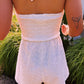 EYELET SMOCKED HALTER ROMPER